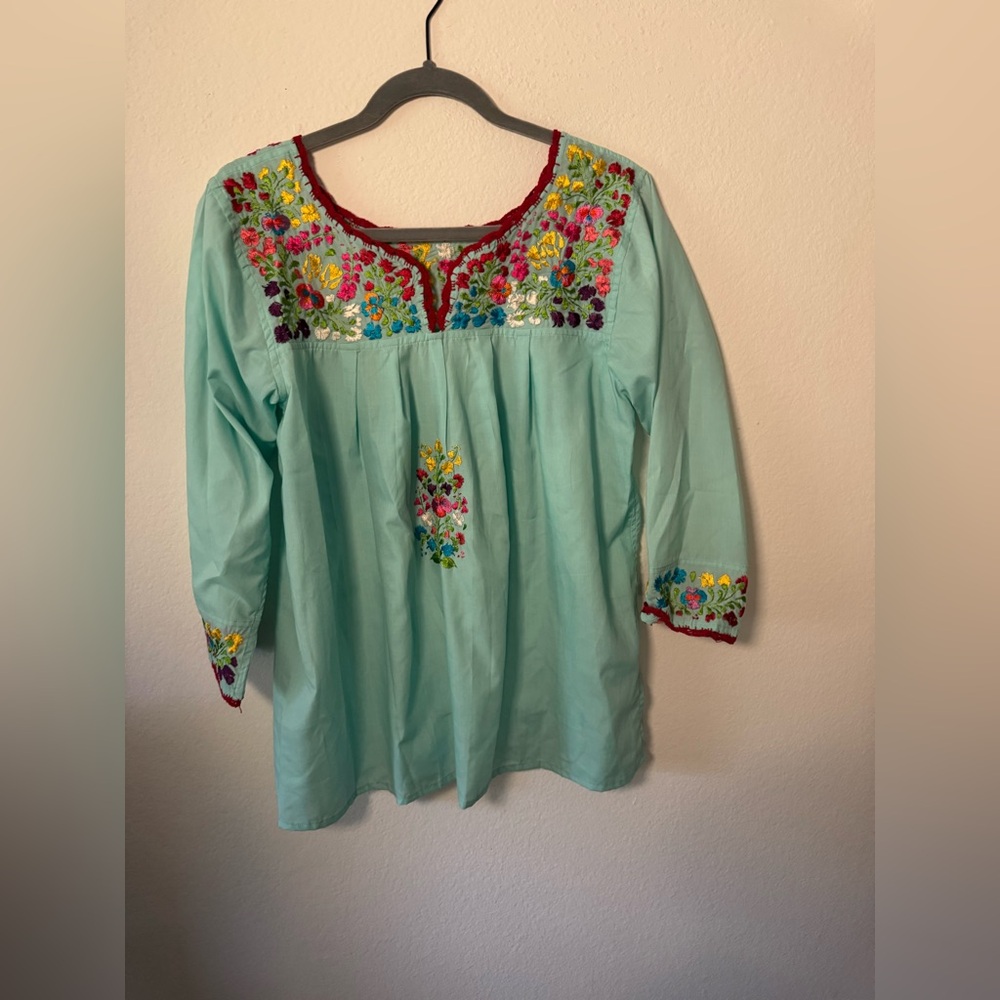 Hand Embroidered turquoise blouse handmade in Oaxaca Mexico